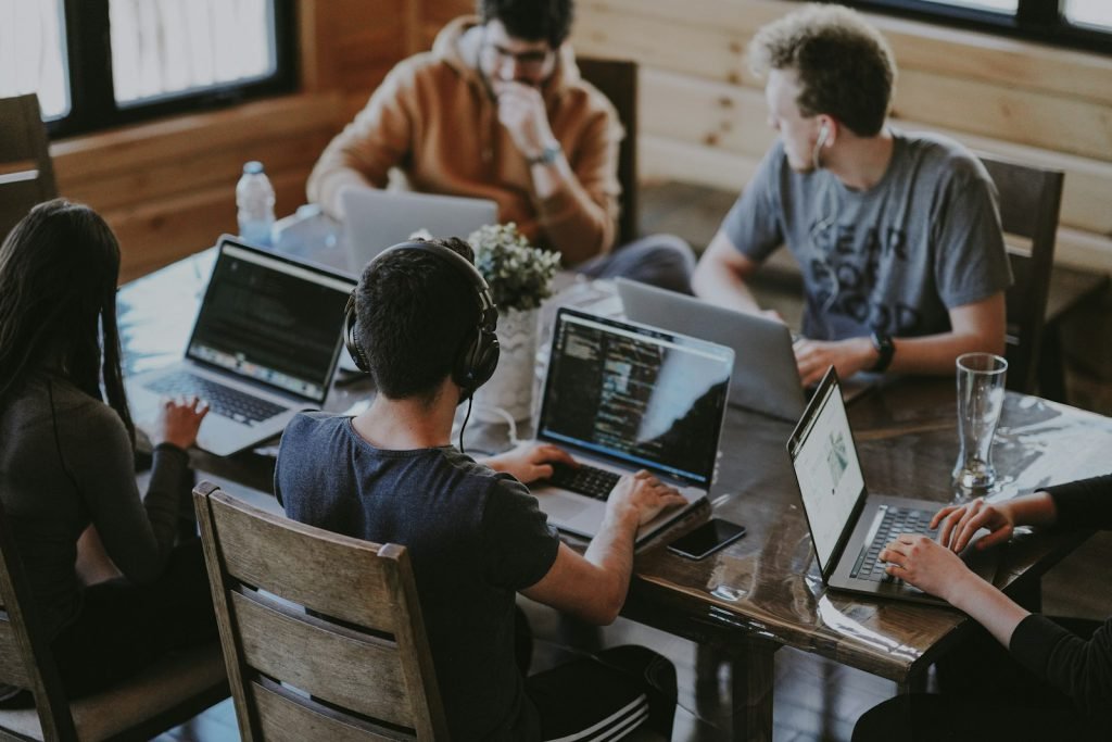 A group working together on laptops