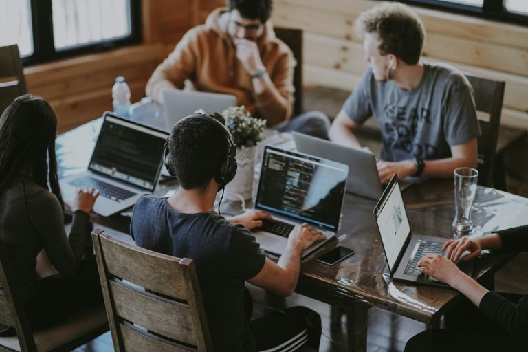 A group working together on laptops